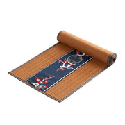 Chemin de table en bambou terracotta, bandeau bleu nuit