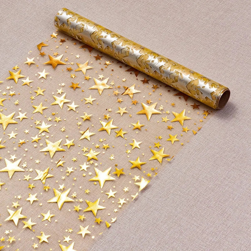 Chemin de table doré à étoiles enroulé