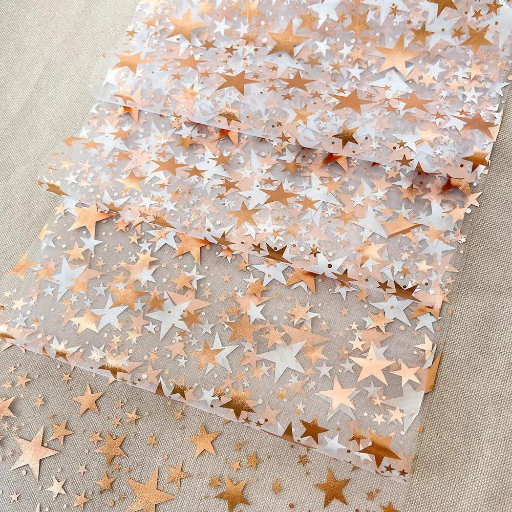 Chemin de table en organza à étoiles rose gold