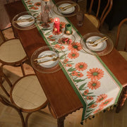 Chemin de table jacquard fleurs orange, tissé à pompons