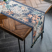 Chemin de table jacquard jungle bleue, tissé à pompons