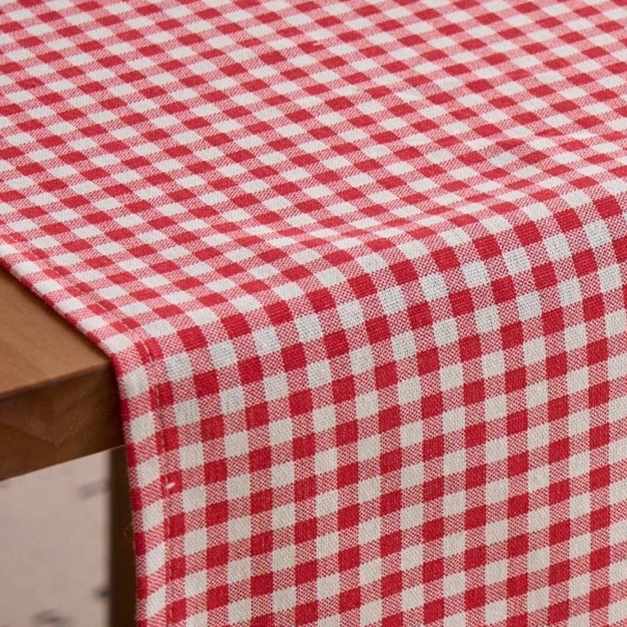 Gros plan du tissage à carreaux vichy rouge et blanc